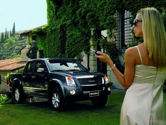 длинноногая блондинка рекламирует Isuzu D-Max Crystal